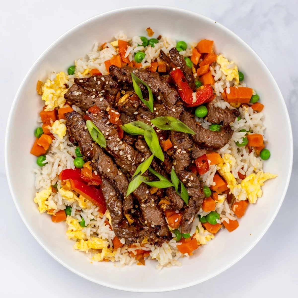 Close-up of savory Beef Fried Rice, loaded with vegetables for a tasty, easy meal idea.