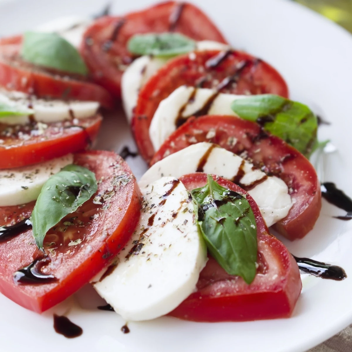 Heart Caprese Salad with Balsamic Glaze ready to serve, perfect for a romantic appetizer or light summer lunch.  