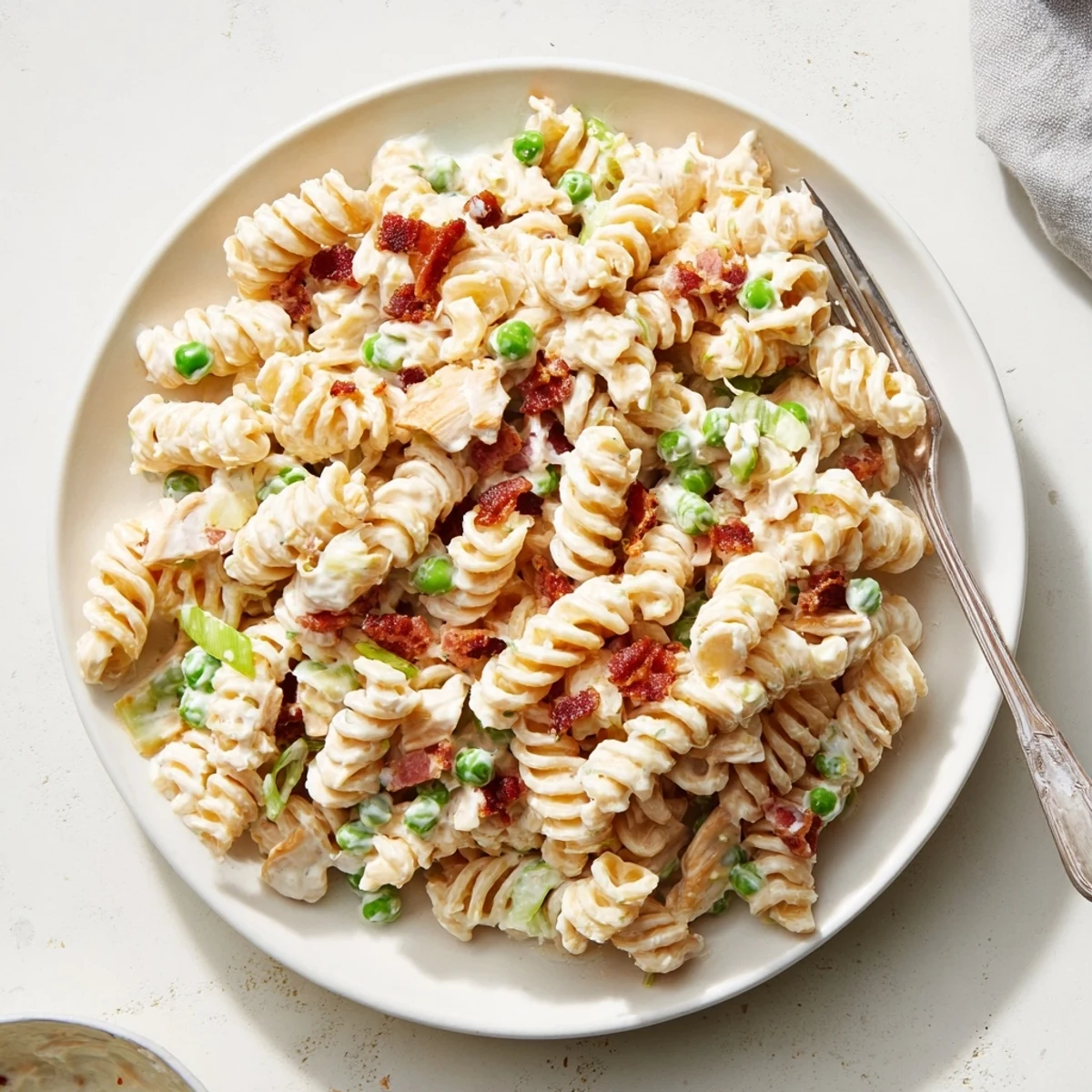 Creamy crack pasta salad loaded with crispy bacon, sharp cheddar, and ranch dressing