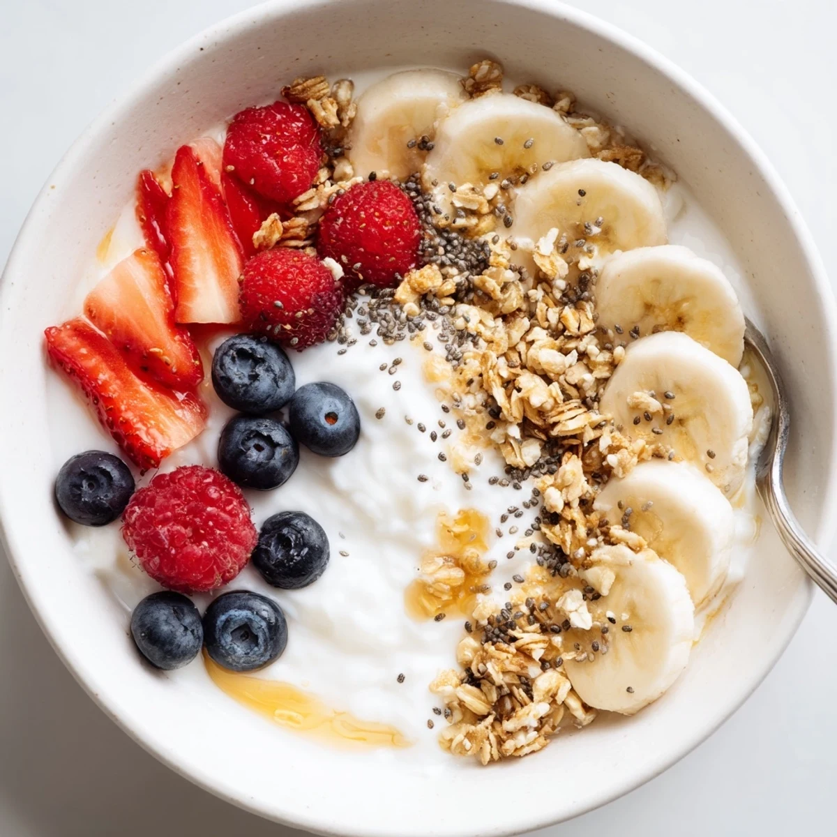Simple Cottage Cheese Breakfast Bowl with sliced banana, chia seeds, ready to serve.