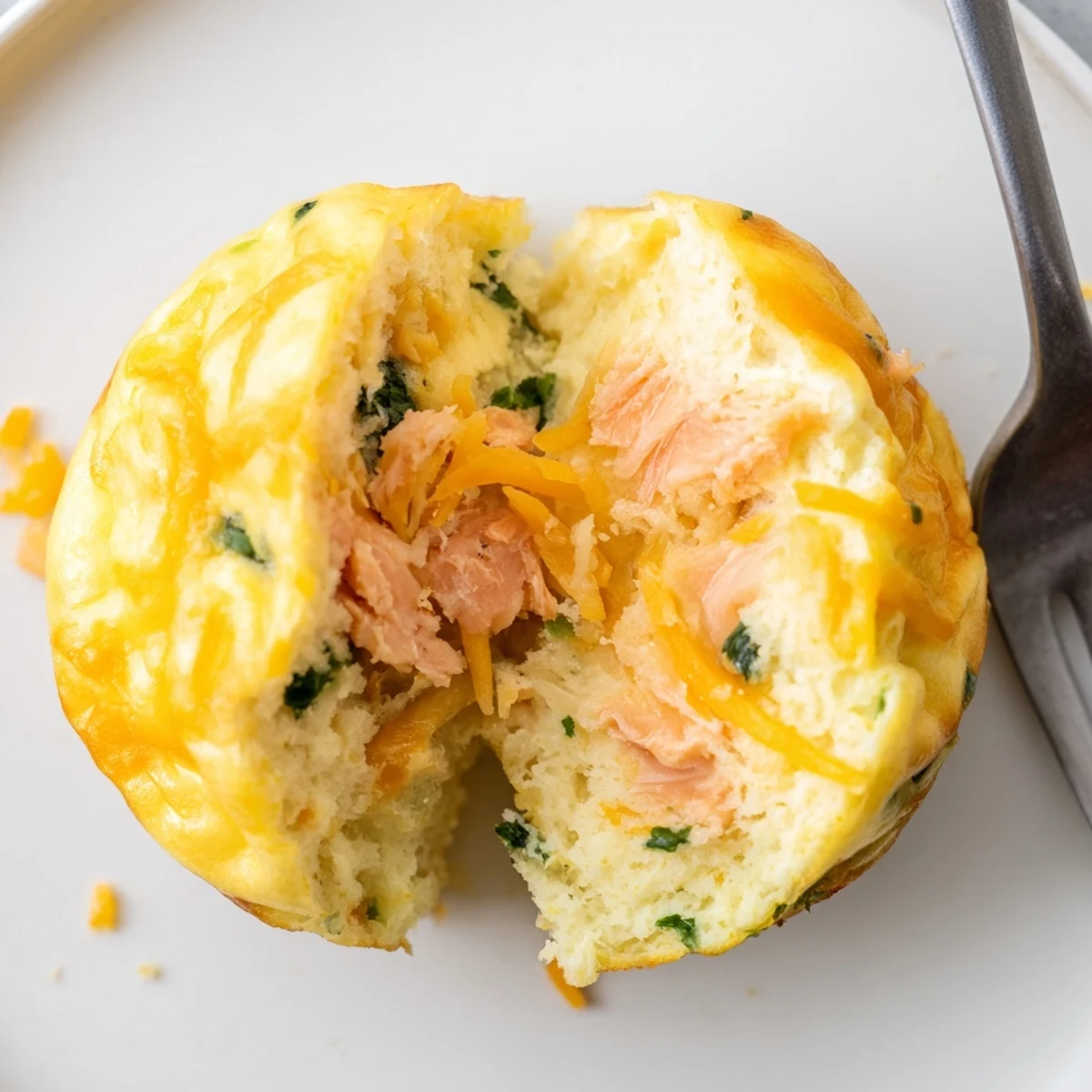 Smoked Salmon Egg Muffins with flaky texture, fluffy eggs, savory herb aroma