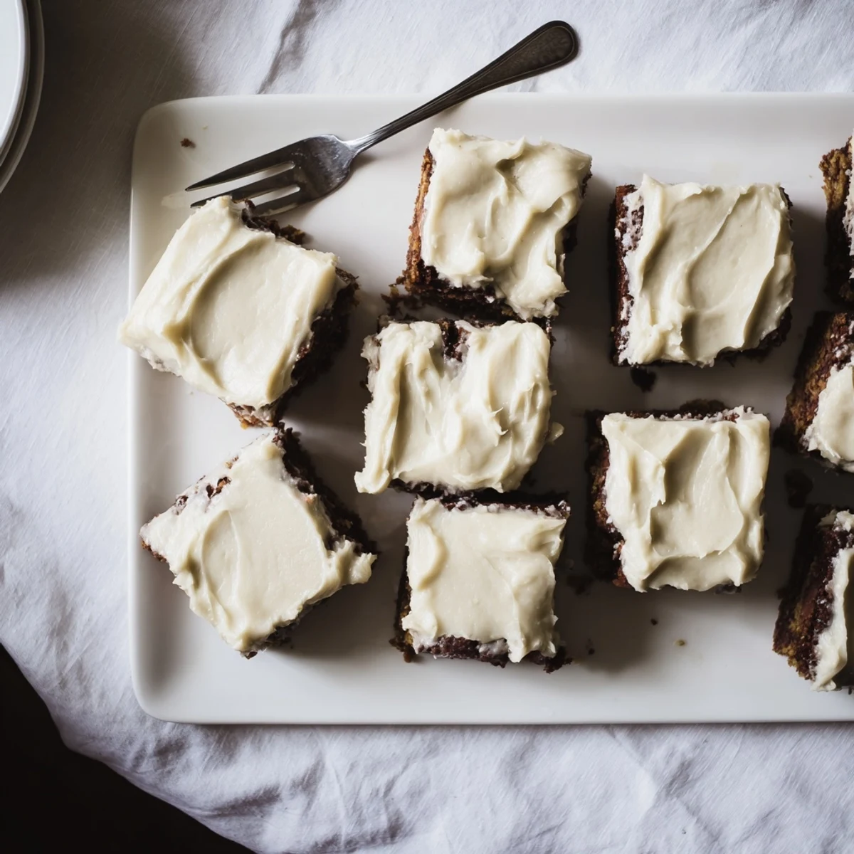 Golden brown banana brownie squares drizzled with creamy brown butter icing